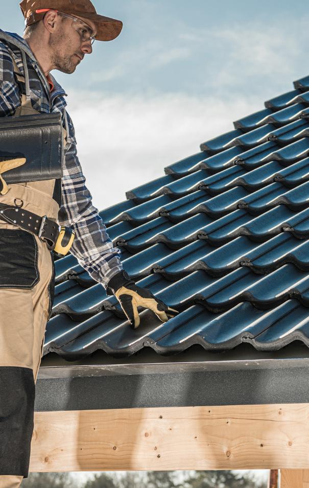 residential-roof-replacment_orlando-fl SunVena Roofing team installing a new tile roofing system on a home in Orlando, Florida